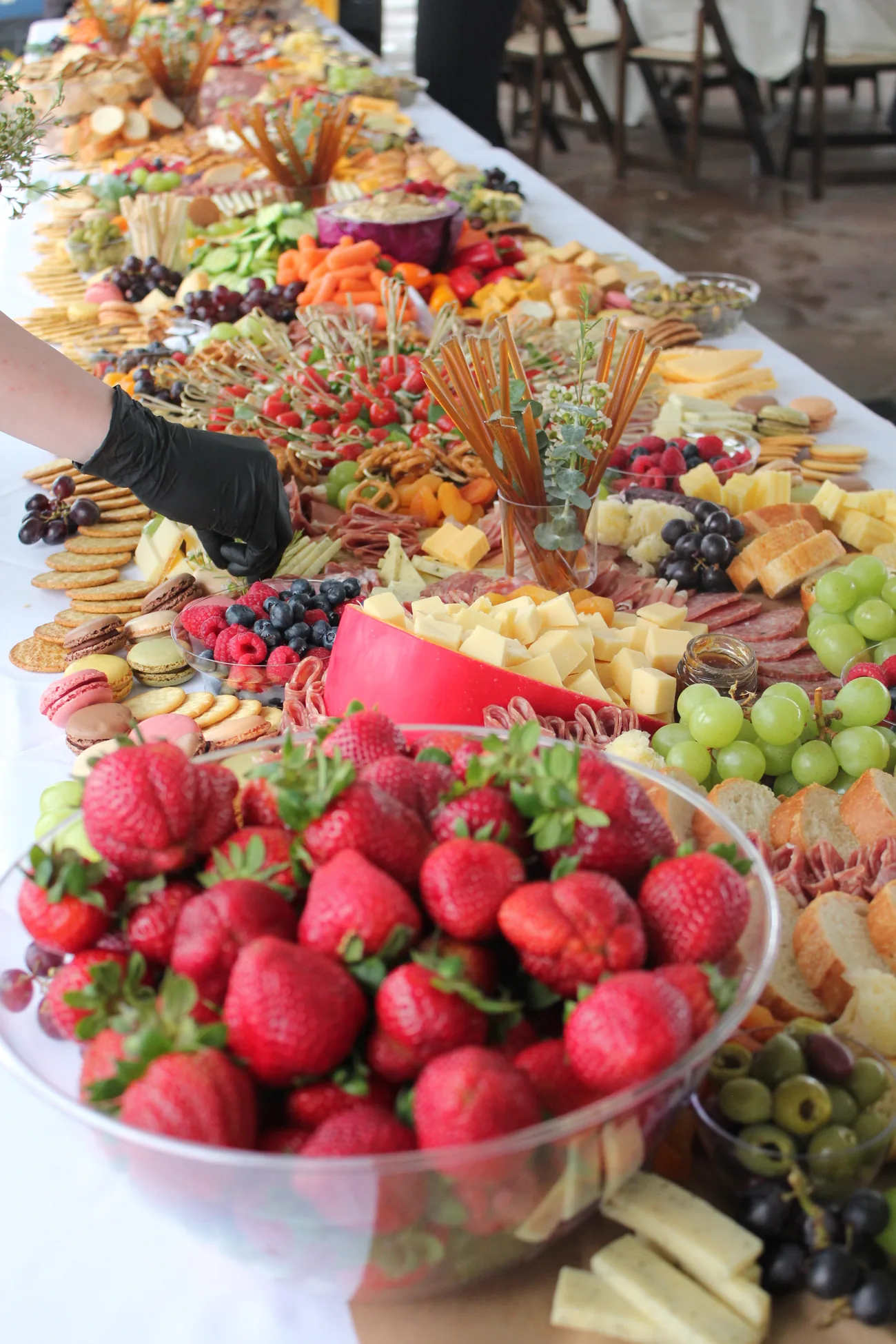 Placing fruit along the table