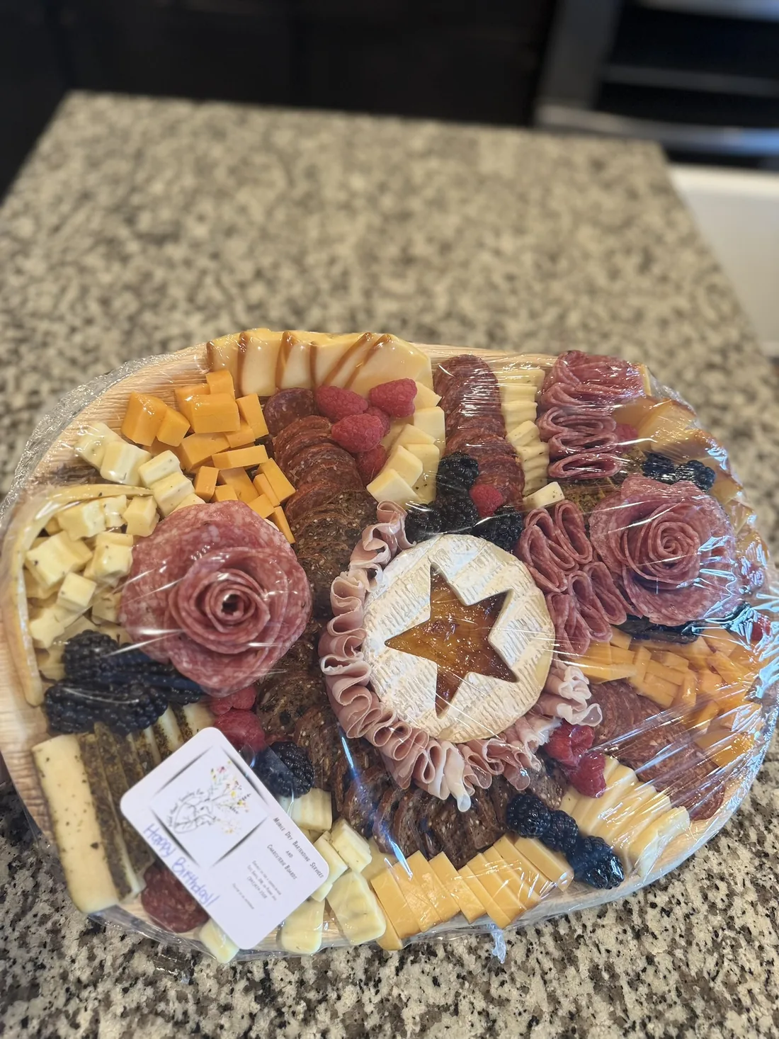 Round board with salami roses