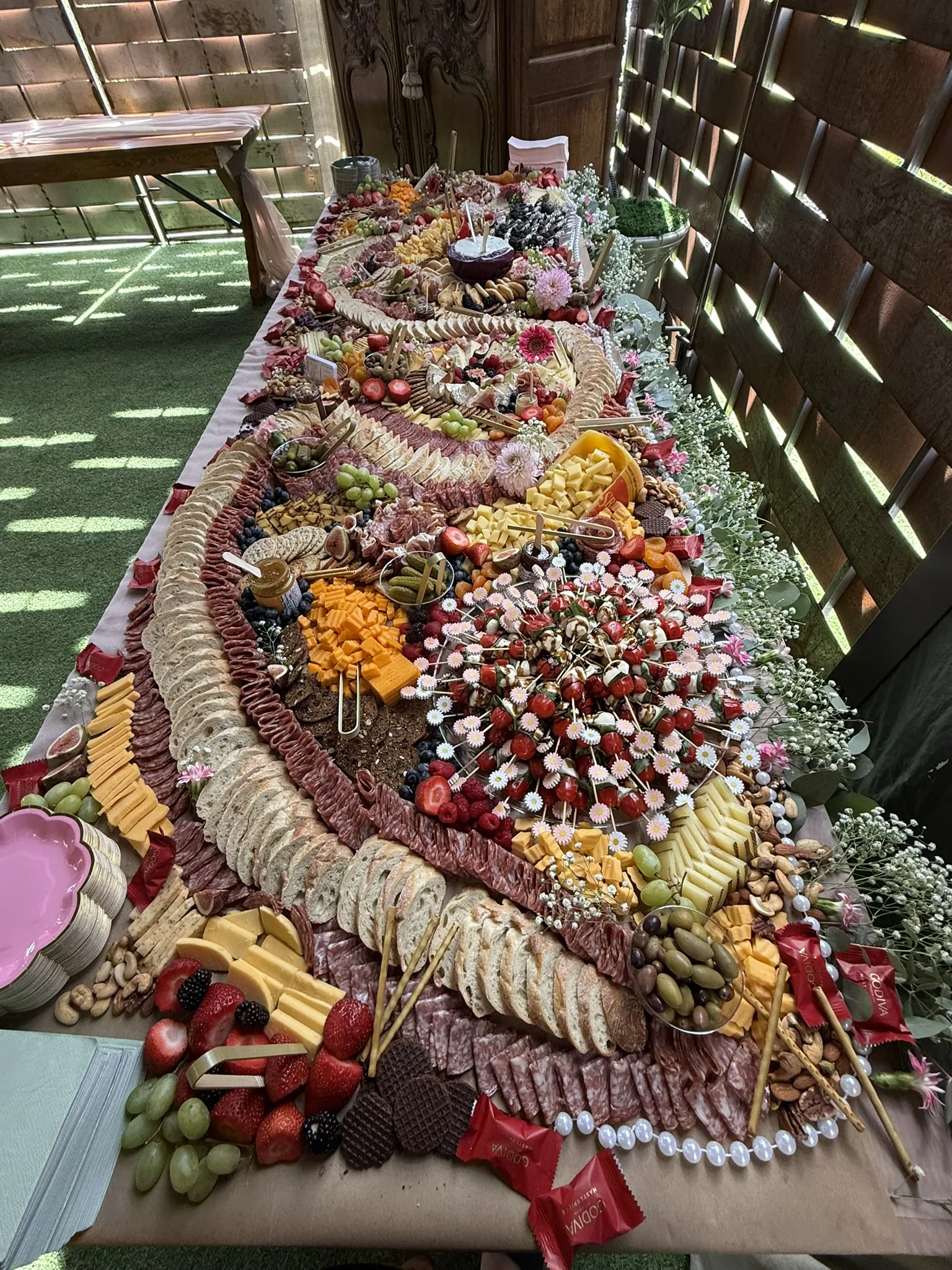 A long grazing table set for an event
